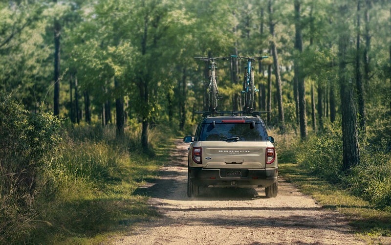 Bronco Driving in Forest